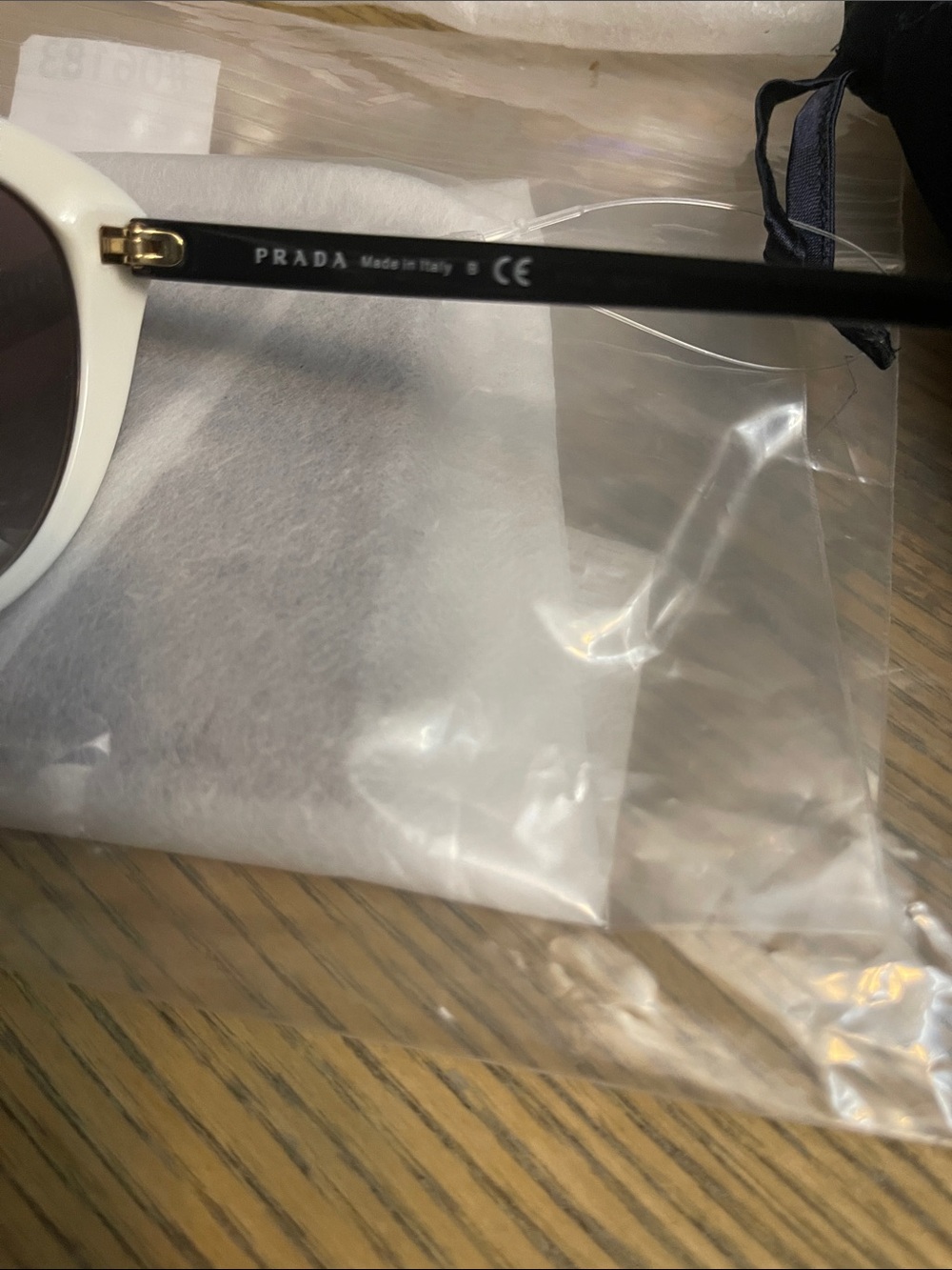 Prada White Round Frame Sunglasses with Dark Lenses - Picture 4 of 5